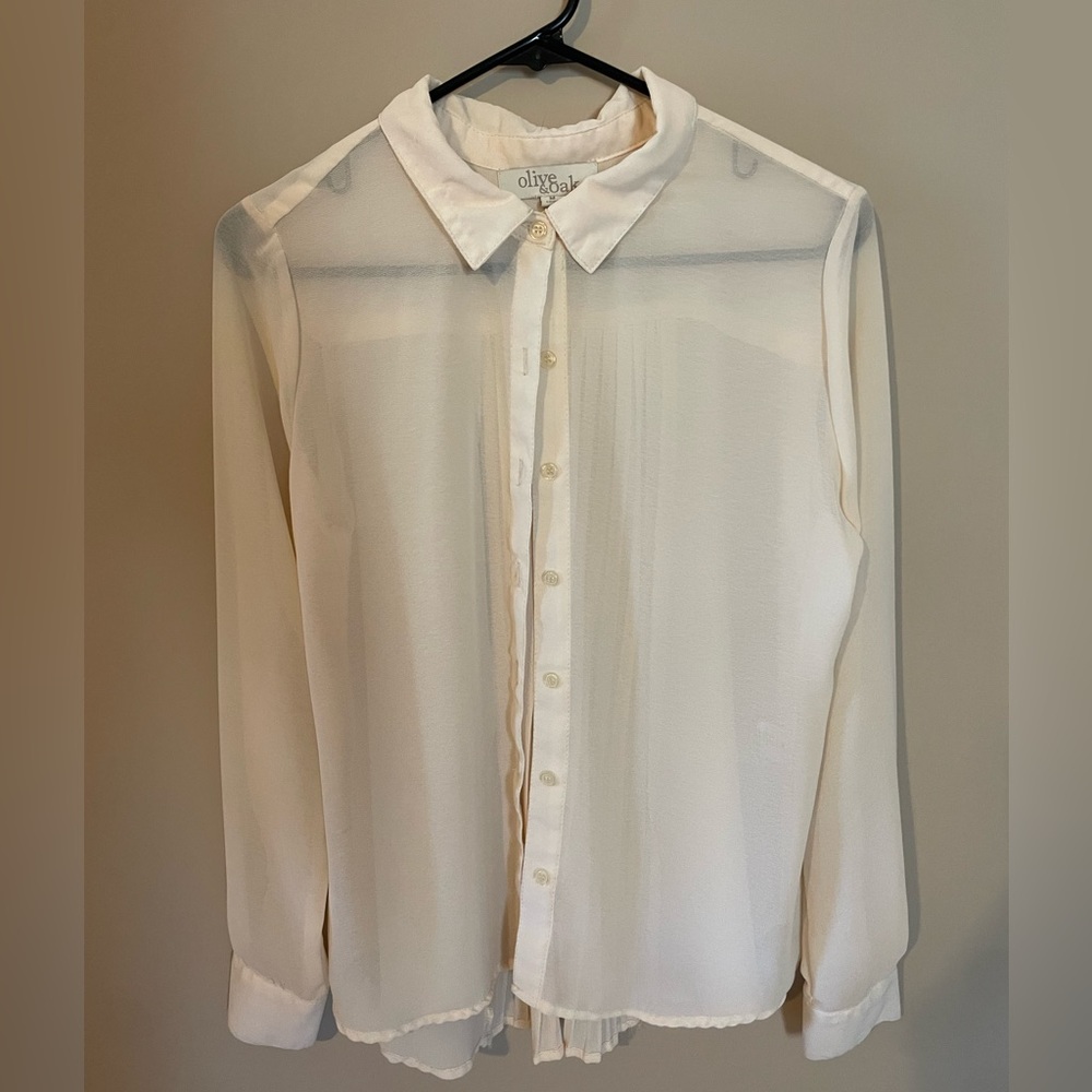 Sheer, off white blouse.